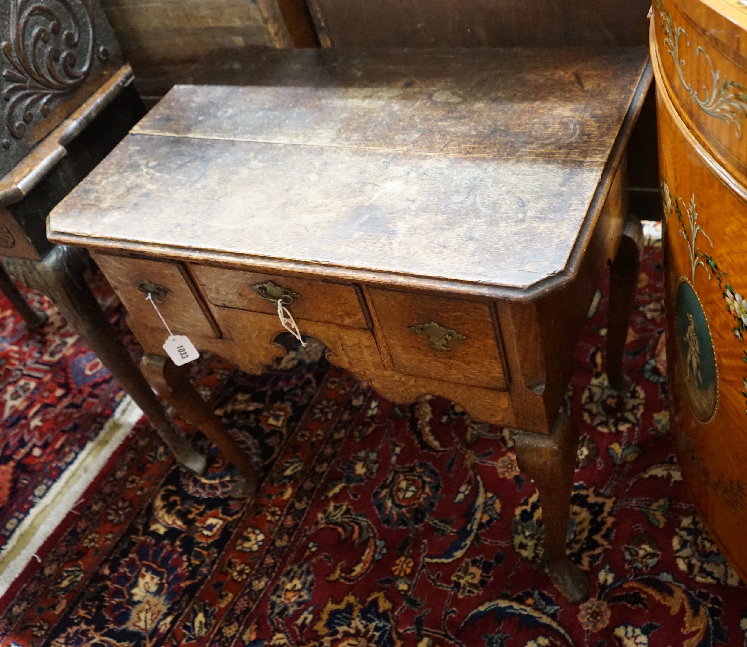 An 18th century provincial oak lowboy, length 73cm, depth 46cm, height 66cm